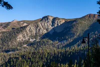 a mountain with trees and a ski lift at Ski in/Out 1B/1BA w/ View - Pool, Jacuzzi, Parking in Mammoth Lakes