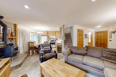 a living room with a couch and a table at Sierra Park Villas 84 R in Mammoth Lakes