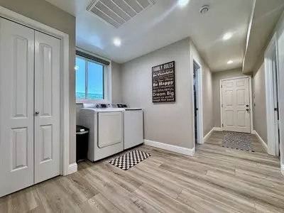 a laundry room with a washer and dryer at Peaceful Country Getaway Near Casino Shopping in Placerville