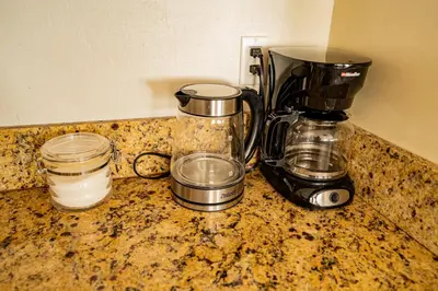 a kitchen counter with a coffee maker and a blender at Amazing Gem Next to golf course with View- Pool & jacuzzi in Mammoth Lakes