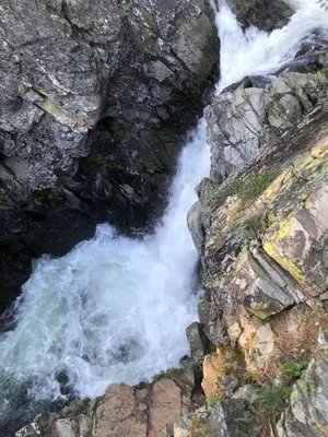 an aerial view of a river flowing through a rocky canyon at Historic Mountain Retreat - Near Boreal - 3 Kings in Emigrant Gap