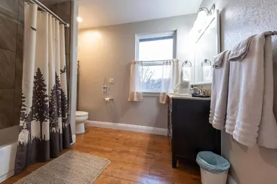 a bathroom with a shower and a toilet and a sink at Historic Mountain Retreat - Near Boreal - 3 Kings in Emigrant Gap