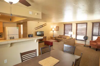 a living room with a kitchen and a dining room at Kingsbury of Tahoe in Stateline