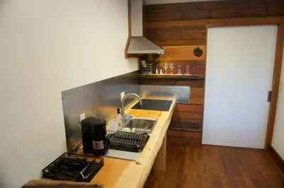 a kitchen with a sink and a counter top at Tamarack Lodge Motel in Tahoe City