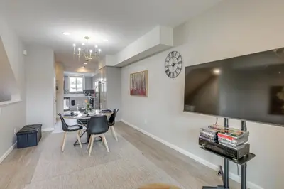 a dining room and kitchen with a table and chairs at Home Base with Easy 1-80 Access 4 Mi to Dtwn Reno! in Reno