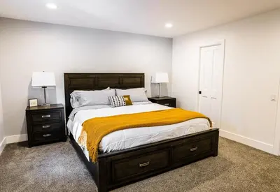 a bedroom with a large bed with two night stands at Mammoth Lakes Ski Getaway in Mammoth Lakes