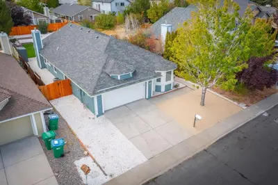 an overhead view of a house with a driveway at Modern Western Retreat Pet Friendly 4 Bed 2 Bath in Reno