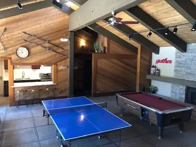 a room with a ping pong table in a room at Lake Village Resort 3 bedroom condo in Zephyr Cove