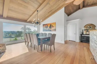 a dining room with a blue table and chairs at Ranch Stay-A 240 acre Working Ranch in Granite Bay
