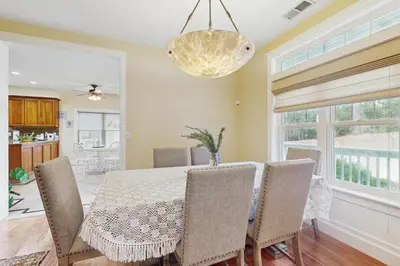 a dining room with a table and chairs at Games, Covered Deck Family Home 28 Mi to Yosemite in Groveland