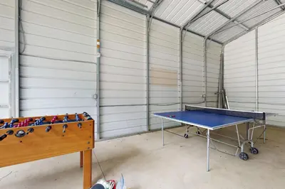 a room with a ping pong table in it at Games, Covered Deck Family Home 28 Mi to Yosemite in Groveland