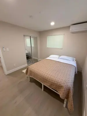 a bedroom with a large bed in a room at 2 bed 1 bath special woodlake B in Sacramento