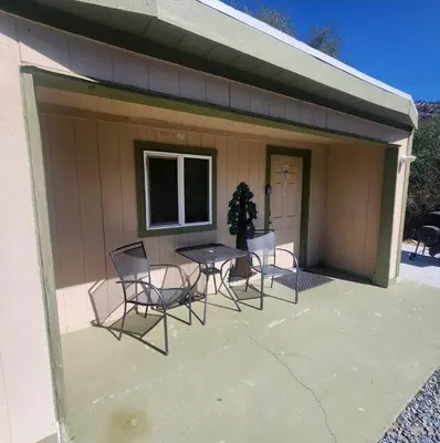 a patio with a table and chairs on it at The Getaway -6 miles from SNP in Three Rivers