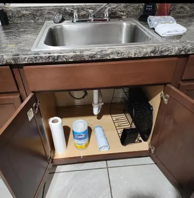 a kitchen sink with toilet paper and a drawer under it at The Getaway -6 miles from SNP in Three Rivers