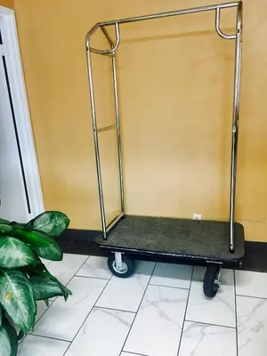 a metal cart on wheels in a room at Travelodge by Wyndham Reno in Reno