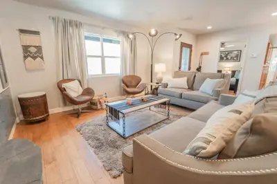 a living room with a couch and a table at Riverside Retreat in Three Rivers - Natures Paradise in Three Rivers