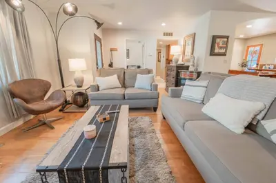a living room with a couch and a table at Riverside Retreat in Three Rivers - Natures Paradise in Three Rivers