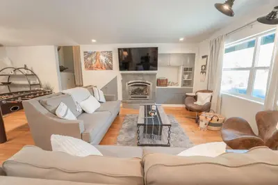 a living room with a couch and a fireplace at Riverside Retreat in Three Rivers - Natures Paradise in Three Rivers
