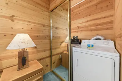 a small kitchen with a refrigerator and a lamp at 589 Danube Drive condo in South Lake Tahoe