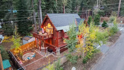 an overhead view of a small house on a train track at Outdoor Dining Backyard Trails Nearby Cedar Hollow Retreat by AvantStay in Tahoma