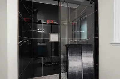 a glass display case in a room at WoodUStau in Coarsegold