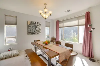 a dining room with a table and chairs at 13 Mi to Slopes Cozy Home with Fenced Yard in Reno in Reno