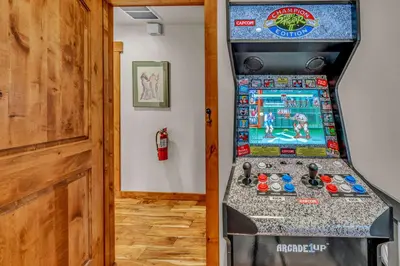 a video game claw machine in a room at Kings Beach Retreat Hot Tub & Game Loft in Kings Beach