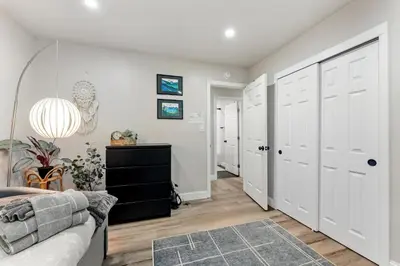 a living room with a couch and a closet at CYH0883- Patricia's Mountain Paradise home in South Lake Tahoe