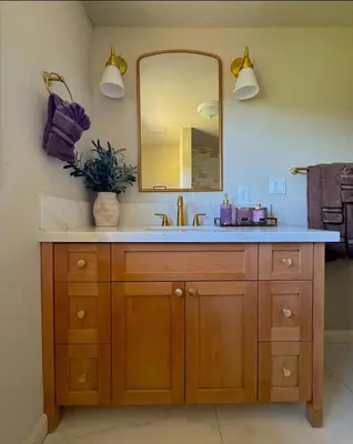 a bathroom with a sink and a mirror at Relax Under the Stars, Best view in town , Yosemite House with Firepit, Hot Tub, Game Room & Pool table in Oakhurst