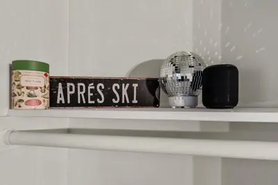 a shelf with aries stick and a ball on it at Charming Tahoe Cabin in Incline Village