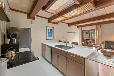 a kitchen with a sink and a stove at Charming Tahoe Cabin in Incline Village
