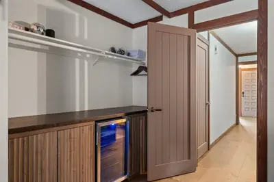 a kitchen with an open door and an oven at Charming Tahoe Cabin in Incline Village