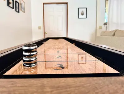 a bowling alley with a number on it in a room at NEW LISTING, Near Yosemite South Gate entrance and town, King bed, Hot Tub, BBQ, Firepit & Mountain Views in Oakhurst