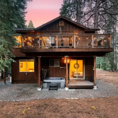 Cozy Tahoe Retreat w Hot Tub Movie Room Forest Views 10th ave 2 by AvantStay