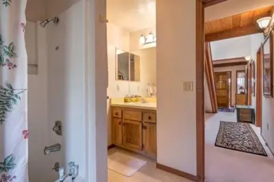 a bathroom with a sink and a shower in it at Dollar Point for 10-Hot Tub-One Block to the Beach-Filtered Lake Views-Quiet Neighborhood in Tahoe City