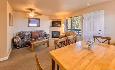 a living room with a couch and a table at Galaxy Way Close to Stagecoach Chair in Stateline