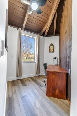 an office with a desk and a window at OctaFarmRetreat - Gateway To Sequoia Natl Park in Visalia