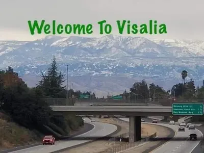 a freeway with a sign that says welcome to vyssinia at Cambridge Corner - Gateway to Sequoia Ntl Park in Visalia