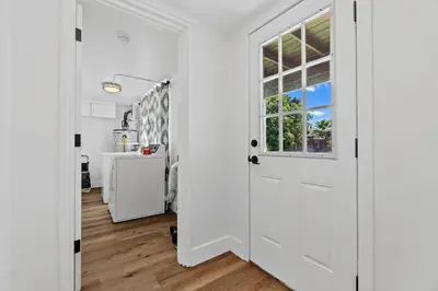 a white door in a white room with a window at Cambridge Corner - Gateway to Sequoia Ntl Park in Visalia