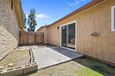 a side view of a house with a sliding glass door at The Royal Oak Splash Sequoia Nat'l Park Lake Mts in Visalia