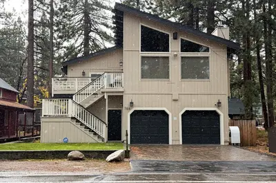 a house with two garage doors at The Regan Beach Vista in South Lake Tahoe