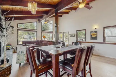 a dining room with a table and chairs at The Regan Beach Vista in South Lake Tahoe