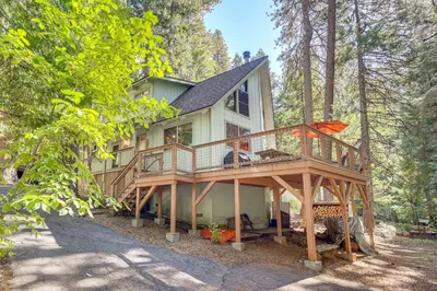 a house with a large deck in the woods at 4 Mi to State Park Quiet Escape with Deck in Arnold in Arnold