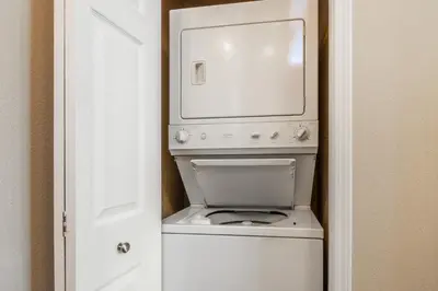 a white washer and dryer in a room at Mammoth Green #220 - Nearly Ski-In Ski-Out 3 Bedroom 2 Bath, Sleeps 8 in Mammoth Lakes