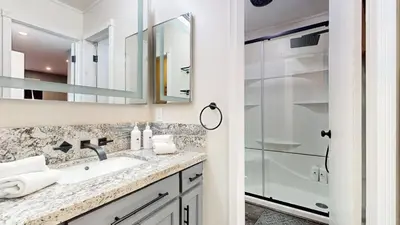 a bathroom with a sink and a shower at Chateau Blanc #2 condo in Mammoth Lakes