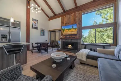 a living room with a couch and a fireplace at Indian Hills 6021 townhouse in Truckee