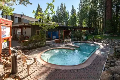 a swimming pool in the backyard of a house at Indian Hills 6021 townhouse in Truckee