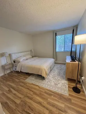 a bedroom with a bed and a television in it at Near Lake, Golf and Tennis - Reno Condo in Reno