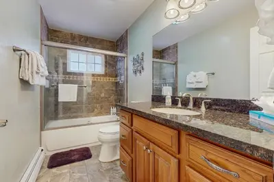 a bathroom with a sink and a toilet and a shower at South Lake Tahoe Charm in South Lake Tahoe