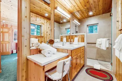 a bathroom with a sink and a shower at Tahoe Getaway in Homewood